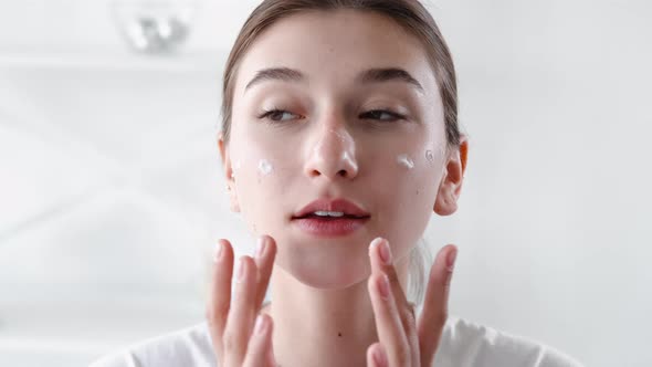 Skin Moisturizing Facial Care Woman Applying Cream
