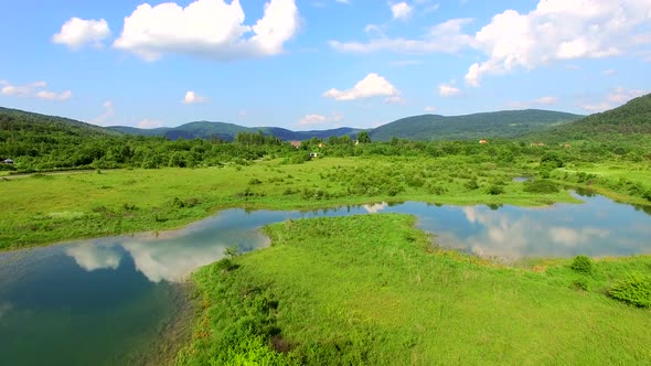 Aerial view of Jesenica river and surrounding in Croatian region Lika.