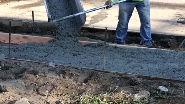 Construction of New Sidewalks Laying Concrete Cement