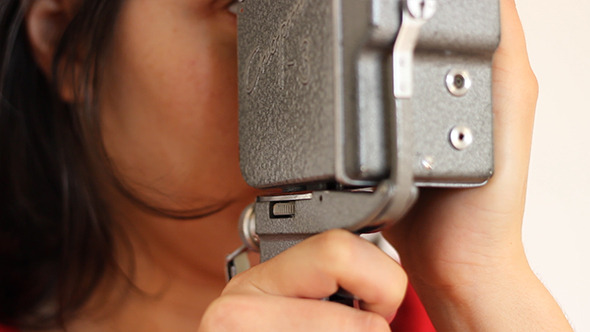 Girl Shooting on Vintage Reel Camera