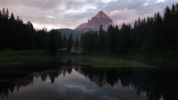 Mountain lake in the Dolomites with Tre Cime di Lavaredo reflection