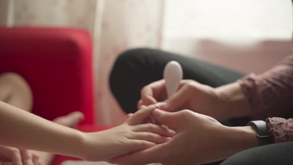 Mom Cuts Her Child's Nails