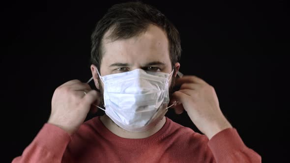 Sick Man Removes Medical Mask Under Remains One More with Blood on It. Covid-19