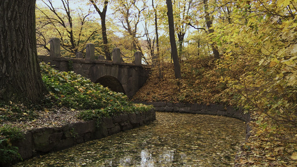 Autumn Stone Bridge in the Old Park