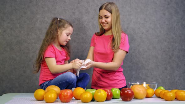 Mother and daughter working together in the kitchen