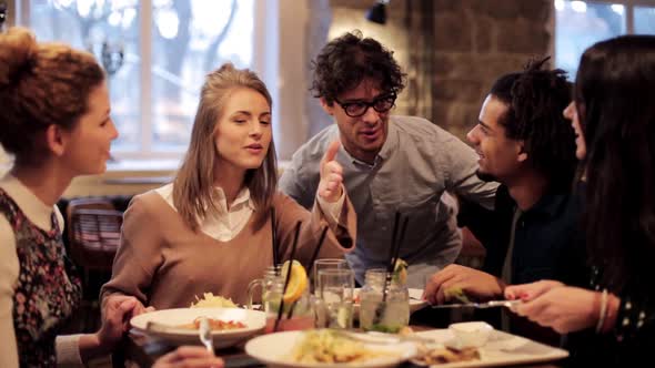 Man Meeting Friends Eating at Bar or Restaurant