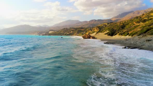 Scenic Aerial Shot of Landscape of Crete Ligres Beach at Sea in Greece at Sunset