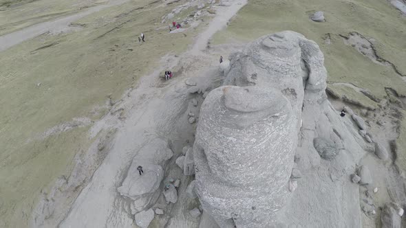 Aerial shot of Bucegi Plateau with tourists 