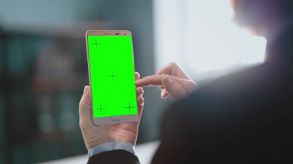Woman Using Mobile with Green Empty Screen