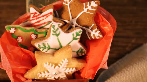 Christmas gingerbread cookies on wooden table