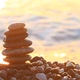 Pyramid Of Pebbles At Sunrise On The Sea - VideoHive Item for Sale
