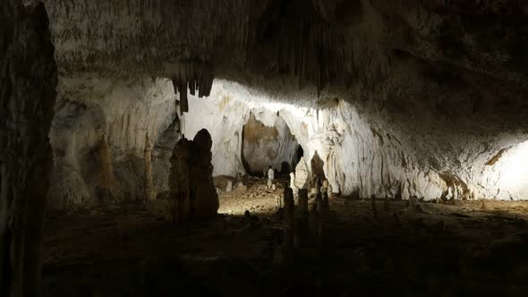 Area deep inside underground  cavern 3840X2160 UHD tilting footage - Slow tilt on ancient formations