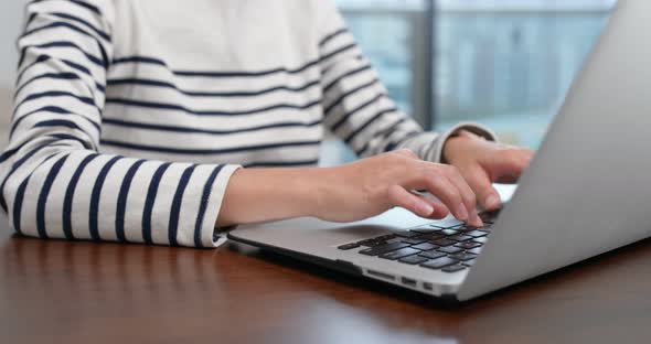 Woman use of computer at home
