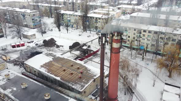 Aerial Shot of Smoke Pouring From Industrial Enterprise Pipe