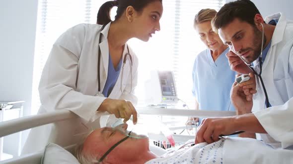 Female doctor examining senior woman