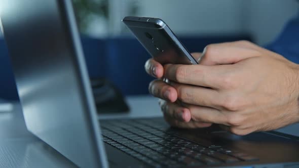 Businessman Hand Using Phone