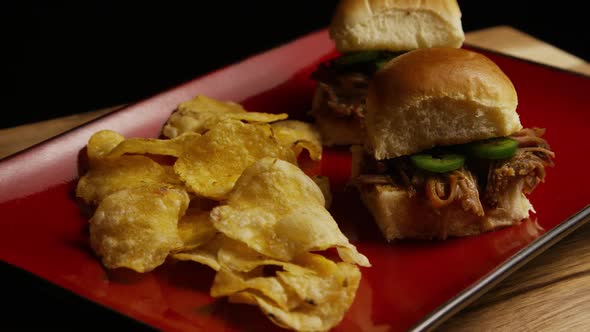 Rotating shot of delicious pulled pork sliders - BBQ 093