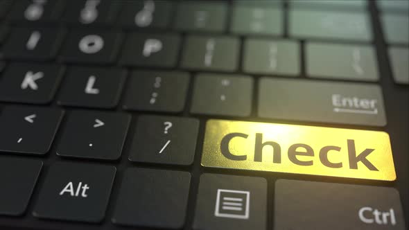 Black Computer Keyboard and Gold Check Key alt