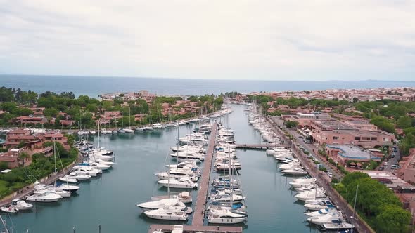 Aerial View on White Sailing Yachts at Portorosa, Furnari, Italy. Mediterranean Sea, Mountains and