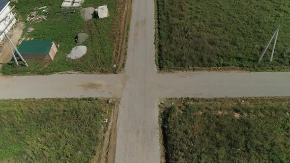 Drone view of Dirt road in the cottage village 28