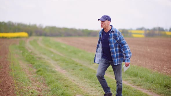 Extremely Angry Farmer In Field