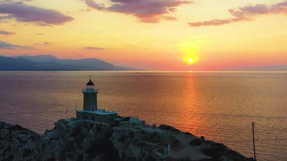 Drone Passing Light House At Sunset Melagkavi Greece 2