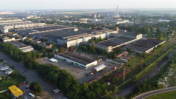 Aerial Drone View Flight Over Industrial Zone on Summer Morning