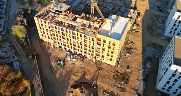Construction Site with Large Residential Apartment of Multistorey Building with Tower Crane