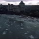 Khotyn fortress against the background of the frozen Dniester river - VideoHive Item for Sale