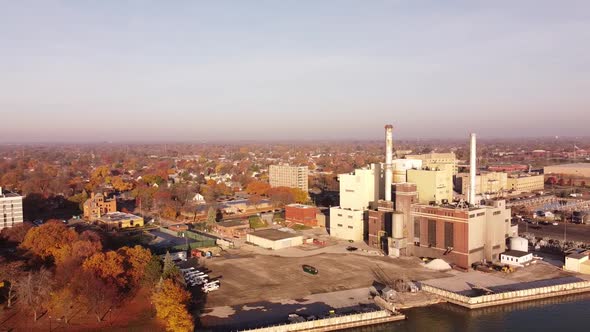 Aerial View Of Power Plant Near The City During Daytime Of Autumn In Wyandotte Michigan, USA - Aeria