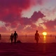 Group of people on the beach at sunset in holiday - HD - VideoHive Item for Sale