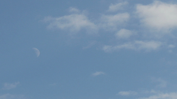 Clouds With The Moon At Daytime