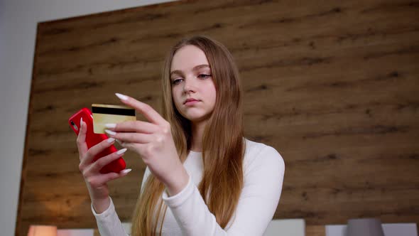 Woman Ordering Food Making Shopping Payments Purchases From Bank Credit Card on Mobile Phone