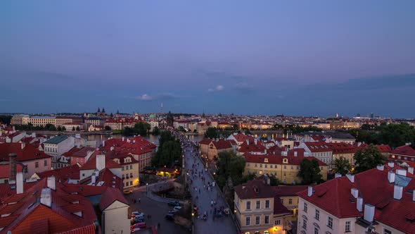 Aerial View of the Old Town Architecture and Charles Bridge Over Vltava River Day to Night Timelapse