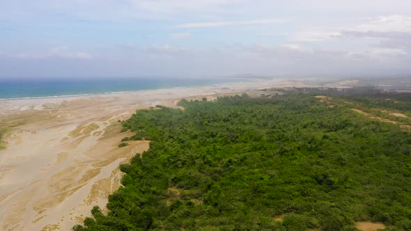 Aerial View of Beautiful Lonely Beach and Paoay Sand Dune. Philippines, Luzon. Sand Dunes Near To