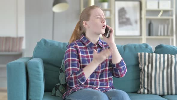 Young Woman Getting Angry on Phone