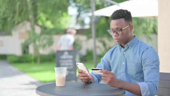 Successful Online Payment on Smartphone By African Man