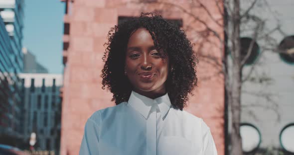 Woman looks forward confidently