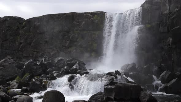 Oxararfoss waterfall located between two tectonic plates, Iceland (slow motion)