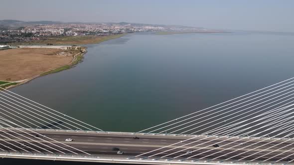 Flying over the longest bridge in Europe - Vasco da Gama in Lisbon, Portugal