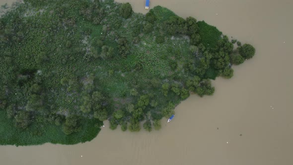 Aerial top down view tourist boat eco tourism