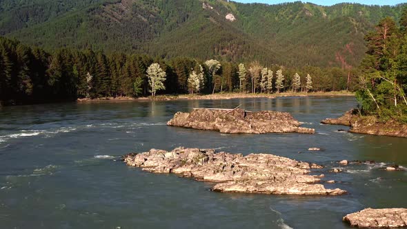 Aerial Video From Drone of Altai Landscape with River Katun and Boulders on in River. Shooting From