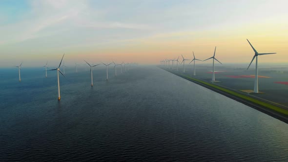 Windmill Park in the Ocean Drone Aerial View of Windmill Turbines Generating Green Energy Electric