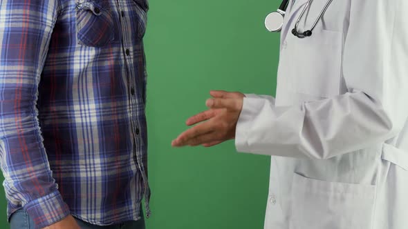 Doctor Shaking Hands with His Patient on Chromakey 1080p