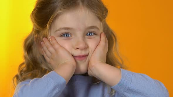 Playful Little Girl Making Funny Face to Camera, Happy Childhood, Preschooler