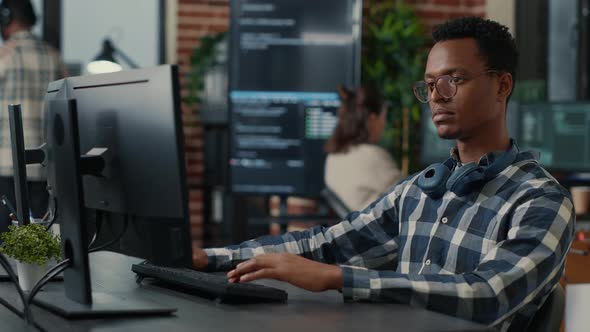 Portrait of Software Engineer Writing Code Arranging Glasses and Being Happy About Parsing Results