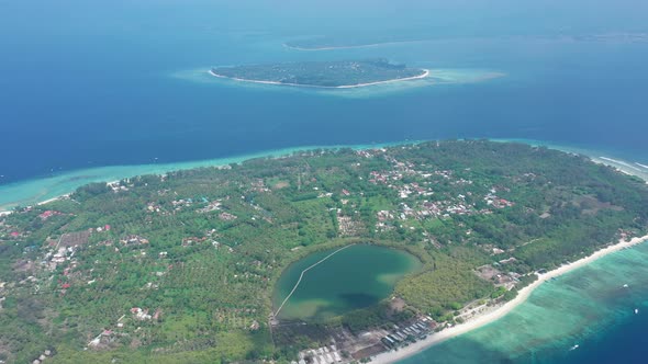 Island with Lovely Tiny Buildings Surrounded By Green Forest