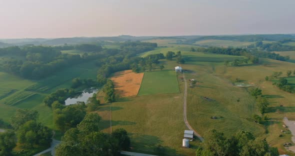 Aerial View of the Meadow Near Highway 70 Road in Pennsylvania USA Behind Trees and Hills