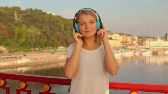 Woman Listens To the Music