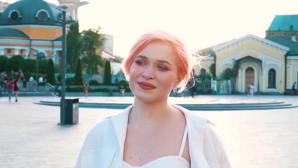 Slowmotion Portrait of Young Woman with Pink Hair